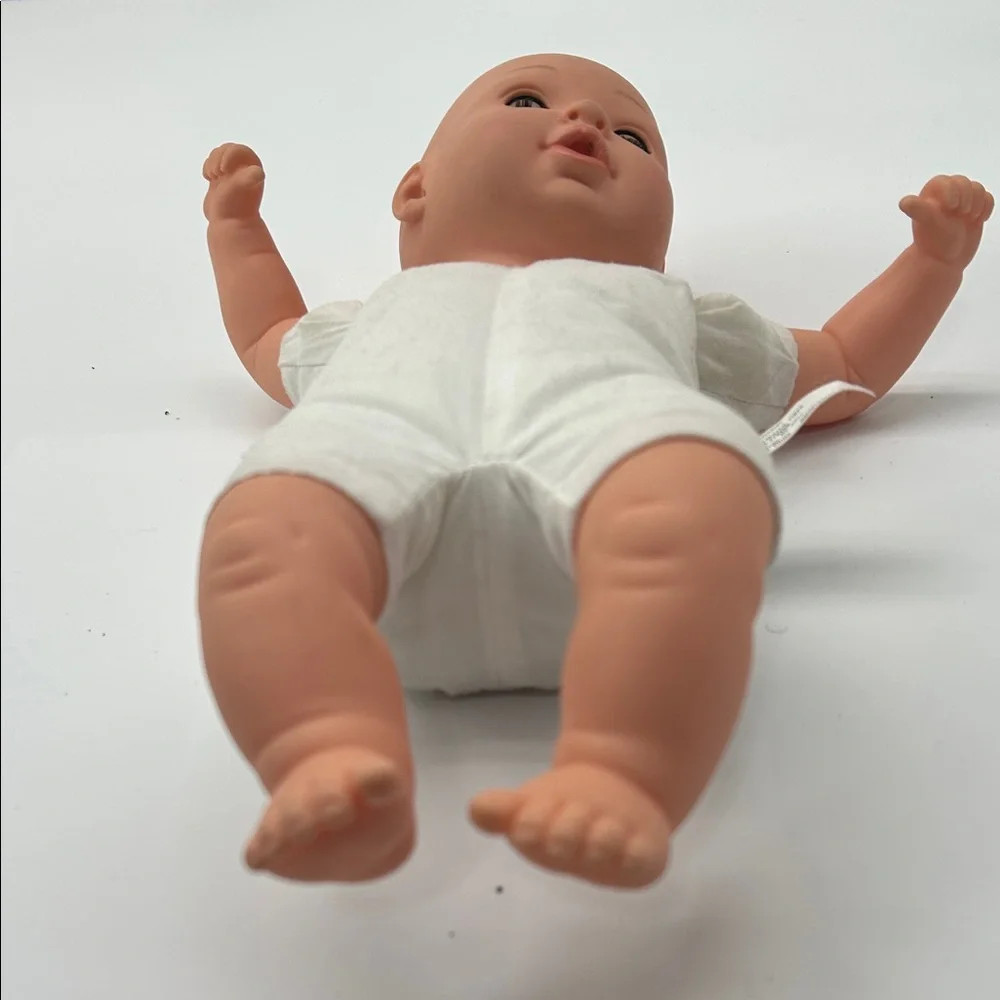 Realistic Baby Doll with White Outfit